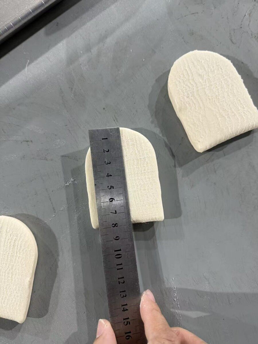Unsteamed lotus leaf bun dough samples from factory testing