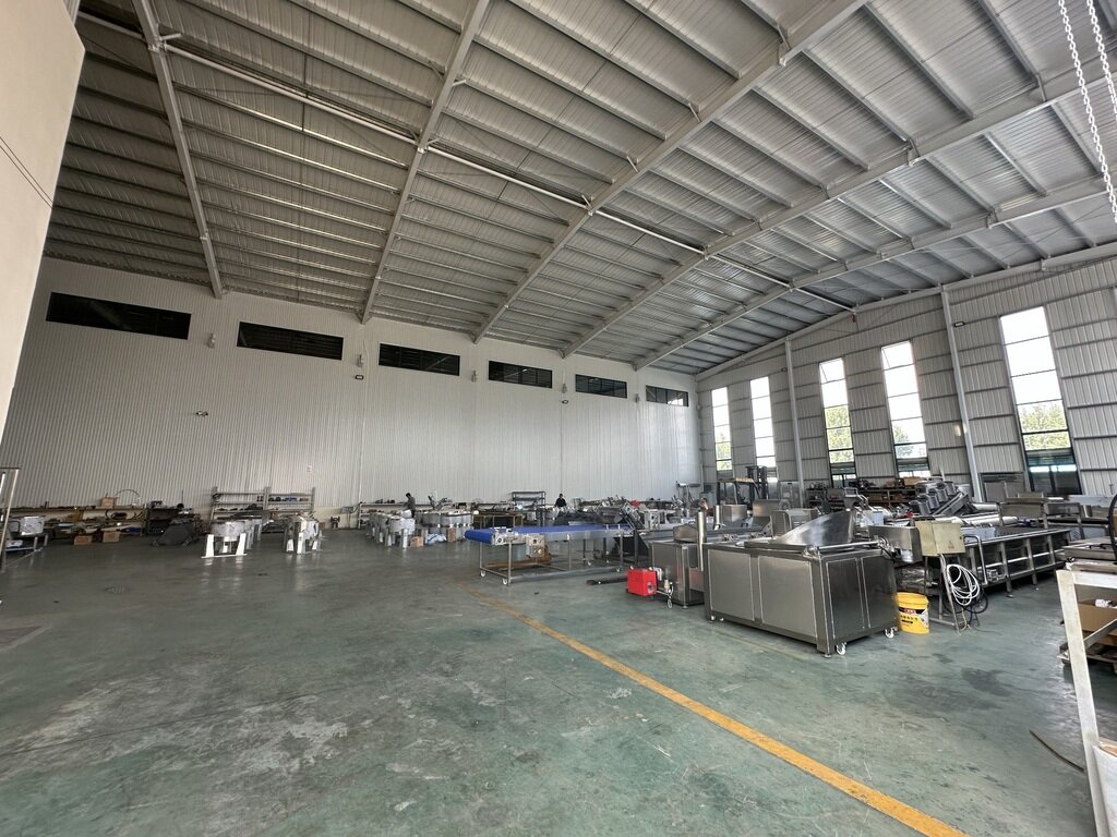 Food processing equipment arranged in a workshop