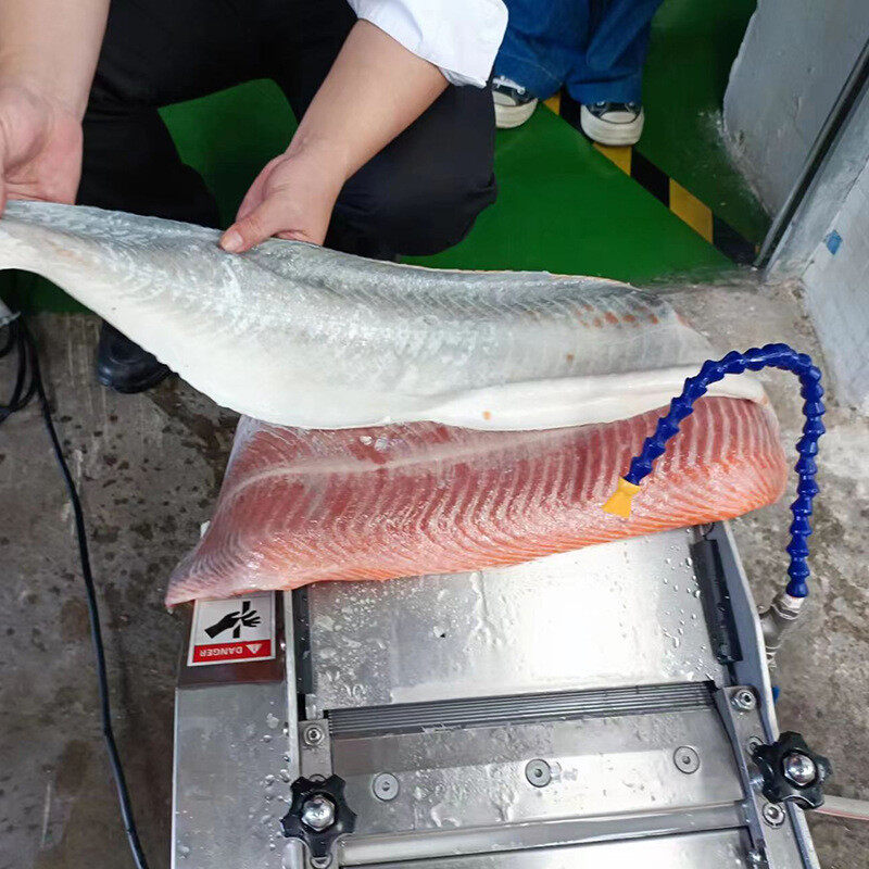 Fish skinning application showing skin and flesh separation at the machine