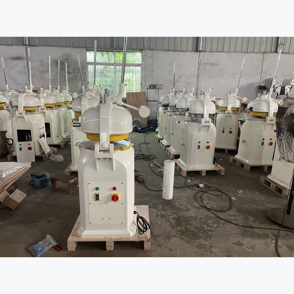 Front view of the dough dividing and rounding workstation.