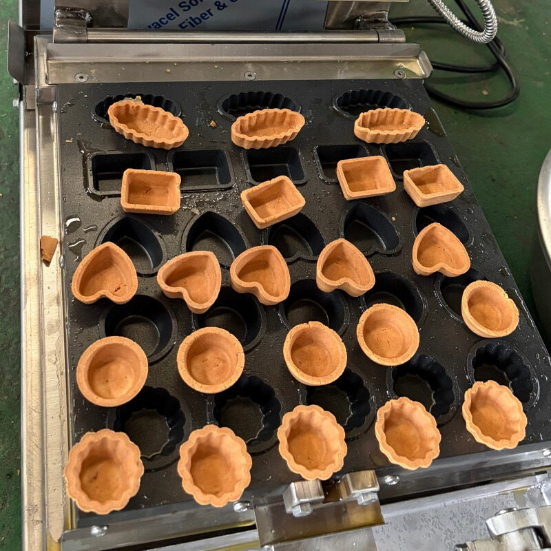Tart shell shape samples displayed with a mould plate.